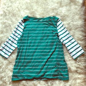 Green and white striped shirt.